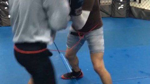Inside boxing drill with bungee cord