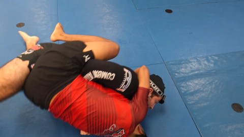 Half Guard to Mount Cross Frame Bridge